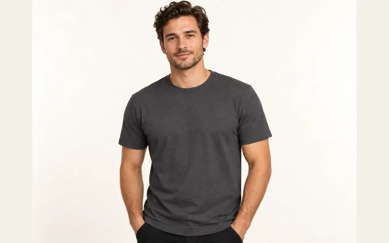 illustrative studio image of a model wearing a blank charcoal T-shirt