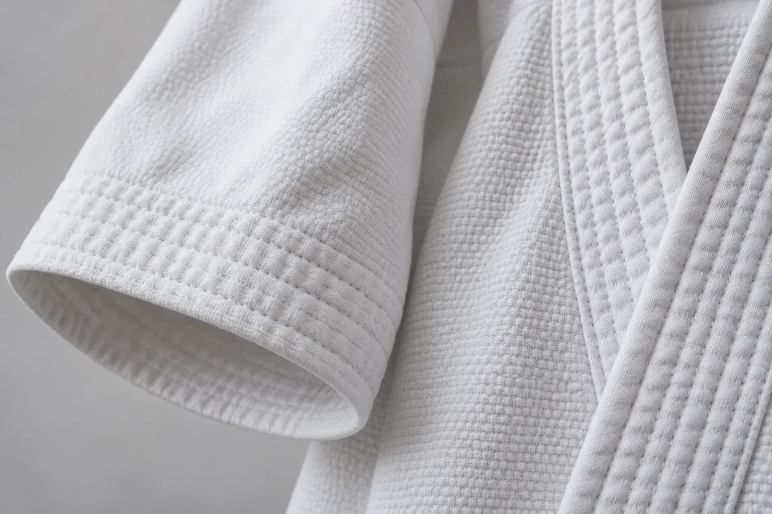Martial Arts Clothing Version Control for UAE Academies — Carry Identity Changes Across Distinct Garments